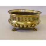 A C19th brass planter with fitted and gadrooned decoration, raised on paw supports, 14" x 7"