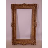 A good giltwood swept gallery frame, rebate 16" x 32"