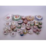 A large collection of Limoges porcelain trinket boxes, largest 5½" x 4"
