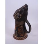 A C19th museum copy of an ancient Greek terracotta rhyton, decorated with a ram's head, 9½" high
