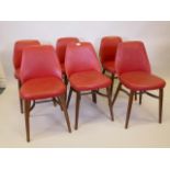 A set of six Benchairs red leatherette dining chairs, A/F minor tears, evidence of woodworm