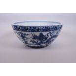 A large Chinese blue and white porcelain bowl decorated with two dragons, 6 character mark to