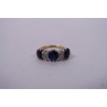 A lady's 18ct gold, diamond and sapphire set ring, one stone A/F, approximate size 'M'