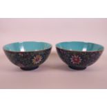 A pair of Chinese polychrome porcelain rice bowls with scrolling lotus flower decoration, 6