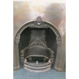 A Victorian style steel fireplace with cast decoration, 40" x 40"