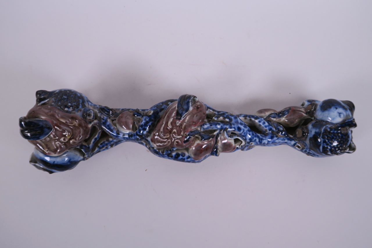 A Chinese blue, white and red porcelain ruyi in the form of a fruiting branch, 12" long - Image 2 of 3