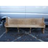 A Victorian pine pew, 87" x 20" x 37"