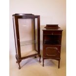 An inlaid mahogany painted cupboard with single drawer and galleried undertier, marked Morris and