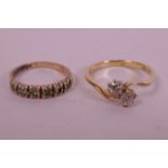 A gold and two diamond dress ring (unmarked) size 'R' together with a small 9ct gold eternity ring