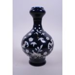 A Chinese blue glazed garlic head shaped vase with pâte-sur-pâte bat and peach decoration, 6