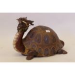 A large Chinese well modelled figure of a dragon tortoise, 20" x 13"