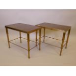 A pair of mid C20th brass end tables with inset leather tops, raised on tapering fluted supports,