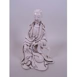 A Chinese blanc de Chine figure of Quan Yin, impressed seal mark verso, 8" high