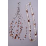 Two mother of pearl and coral necklaces