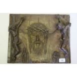 A bronze plaque, Christ with a crown of thorns, flanked by two thieves, signed Marione 15" x 12"