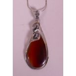 A large silver and agate pendant necklace, with lily decoration, 3½" drop