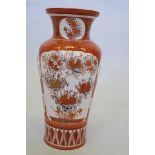 A Meiji Kutani vase with decoration on a red ground with gilt highlights, signed to base, 14" high