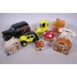 A large ceramic model Morris Minor Countryman money box together with eight other ceramic money