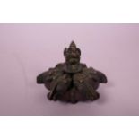 An Indian bronze six section censer decorated with images of Ganesh and verdigris patina, 3"