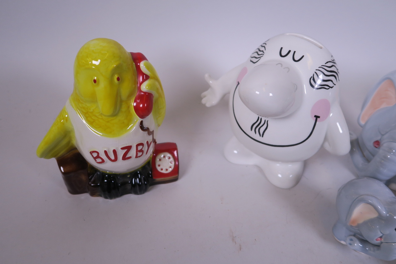 Five ceramic money boxes including two advertising 'B.T. Busby' and 'Ryman's Man', a giraffe, - Image 2 of 2