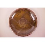 A studio pottery shallow bowl with high fired glaze, impressed marks 'Wenford Bridge' (possibly