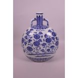 A Chinese blue and white porcelain two handled moon flask with all over floral decoration, 6