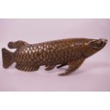 A Chinese bronze figurine of a carp, 11" long