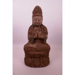 A Chinese carved and painted wood figure of Quan Yin, 14½" high