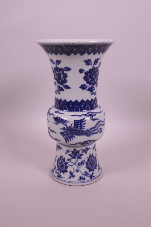 A Chinese blue and white porcelain gu shaped vase with phoenix and flower decoration, 6 character