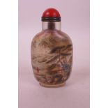 A Chinese reverse painted glass snuff bottle decorated with figures and birds in landscapes, 3½"