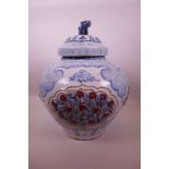 A large Chinese Ming style blue and white pottery globular jar and cover, with a kylin knop and