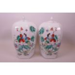 A pair of Chinese famille verte enamel jar and covers of hexagonal form decorated with children