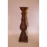 An antique carved wood column, 39½" high