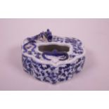 A Chinese blue and white porcelain ink pot with applied dragon and bat decoration, 4½" x 4"