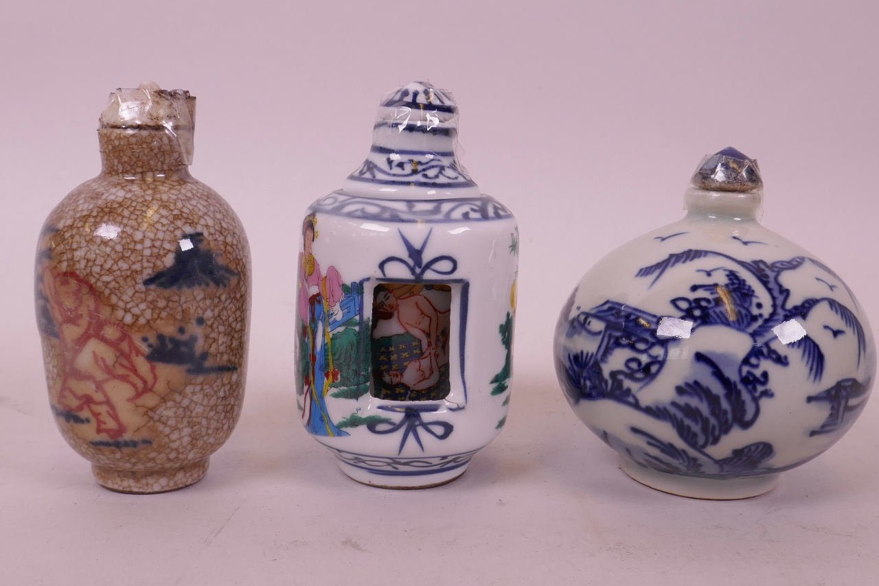 A Chinese polychrome porcelain erotic snuff bottle, together with a blue and white porcelain snuff