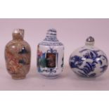 A Chinese polychrome porcelain erotic snuff bottle, together with a blue and white porcelain snuff