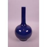 A Chinese blue ground bottle vase, 8" high