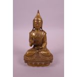 A small Sino-Tibetan bronze Buddha, 5" high