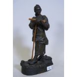 A bronzed spelter figure, 'aux champs' after Quinquand, 14" high