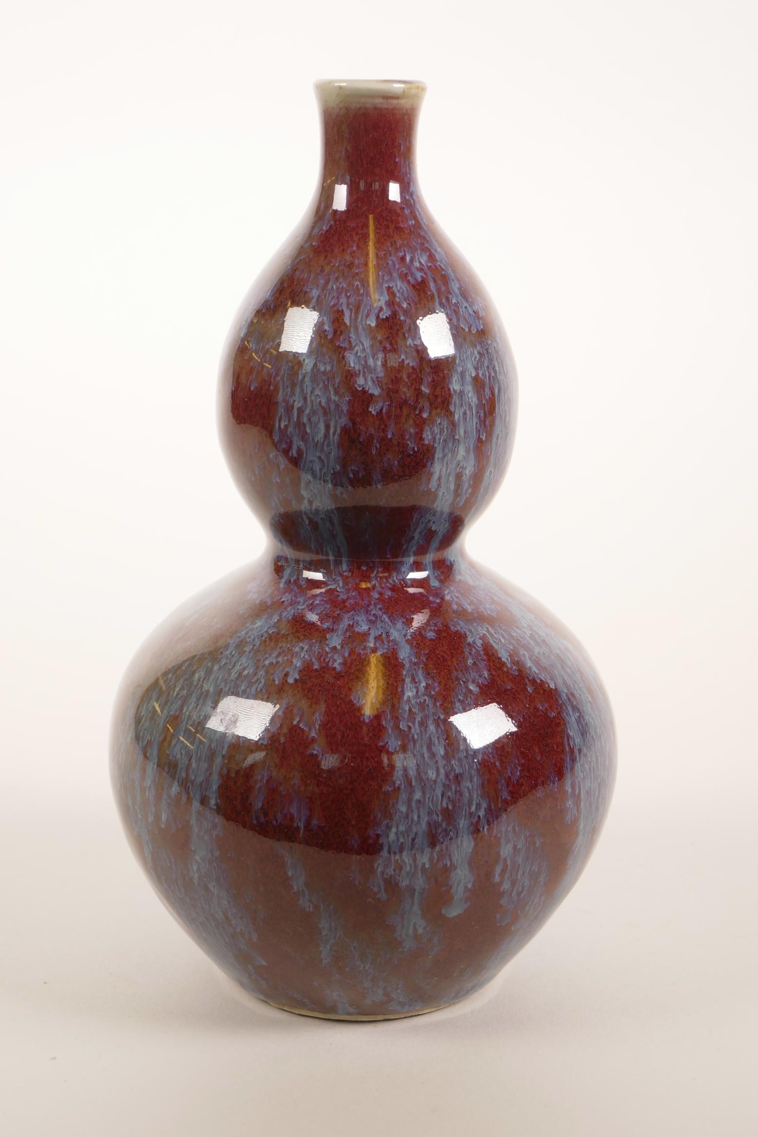 A Chinese double gourd pottery vase with a teal and burgundy glaze, 7½" high - Image 2 of 3