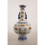 A Chinese polychrome porcelain vase with two handles and butterfly decoration, seal mark to base,