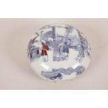 A Chinese blue and white porcelain circular box and cover decorated with figures in a landscape,