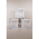A set of six handmade LSA Remi wine glasses designed by 'Monika Lubkowska-Jonas' with hand painted