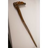 A fruitwood walking stick, the handle carved as a nude, 34" long