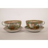 A pair of Canton enamel porcelain cup and saucers, decorated with figures and flowers, 4½" diameter