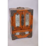 A Chinese stained wood jewellery box with brass mounts and inset carved jade panels. the two doors