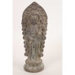 A Japanese bronze Kanon figurine of a female deity, 7" high