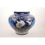 A large Chinese blue ground pottery jardiniere with applied lotus pond decoration, 4 character