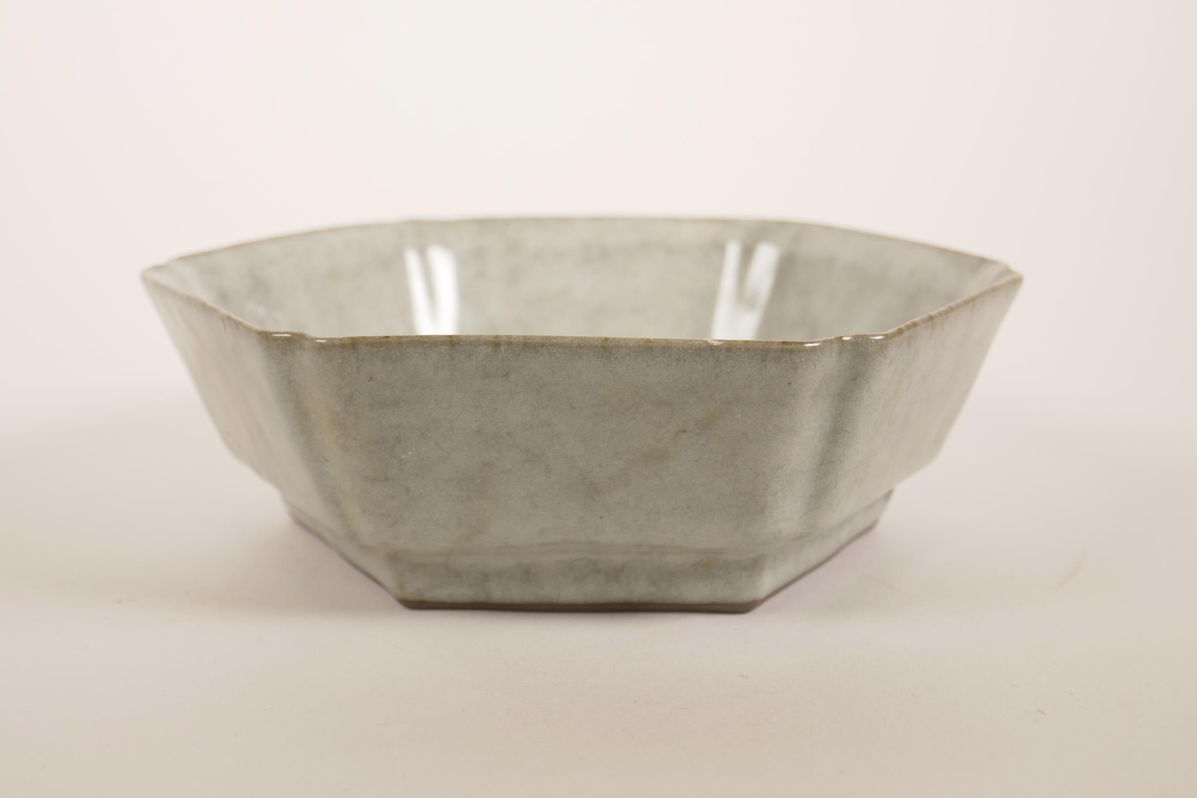 A Chinese celadon glazed hexagonal pottery dish, 6½" x 6½"