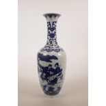 A Chinese blue and white porcelain vase decorated with a family in a garden setting, 6 character